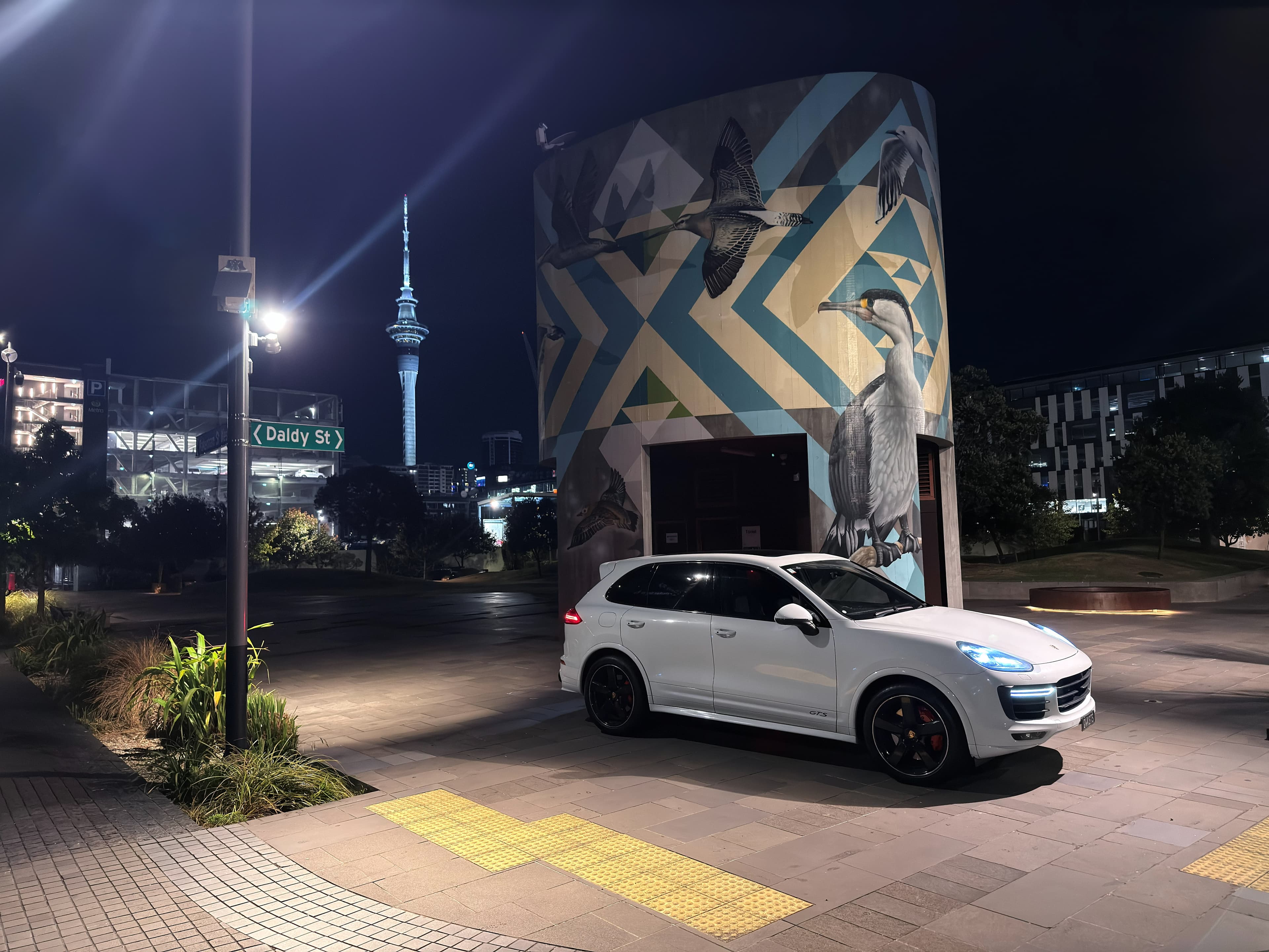 Prestige Automotive vehicle outside a premium Auckland venue at night